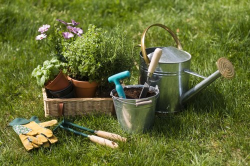 Gardening tools on grass for Gunnersbury services