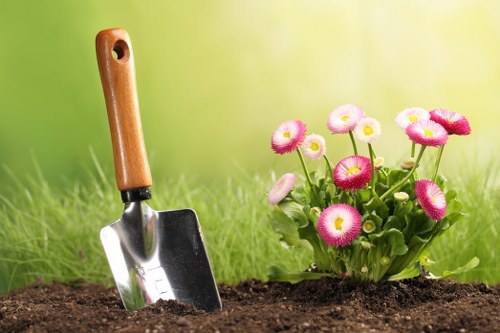 Volunteers from a community charity receiving donated plants and compost